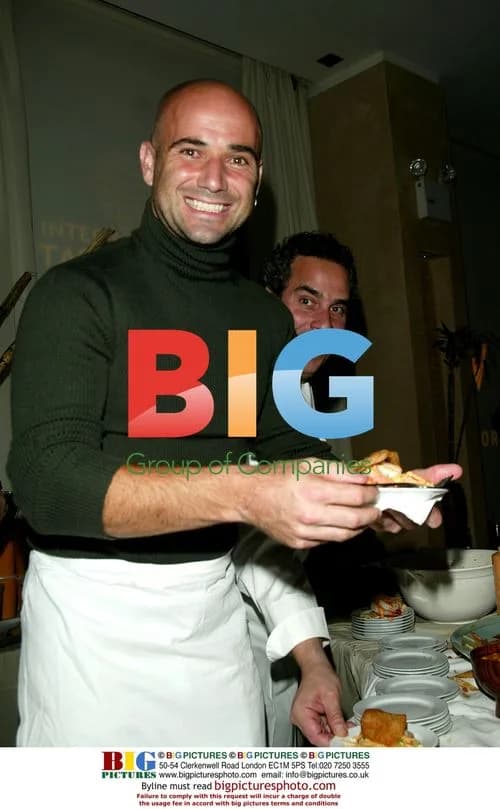 Agassi serves hors d'oeuvres with Lomonaco at NYC benefit