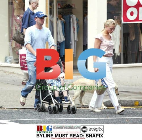 Actress Samantha Janus and family walk in London