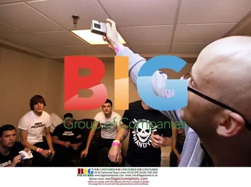 Moby takes photos of The Hives backstage