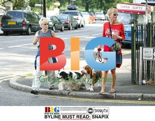 Radio 1 DJs Sara Cox and Emma B with dogs