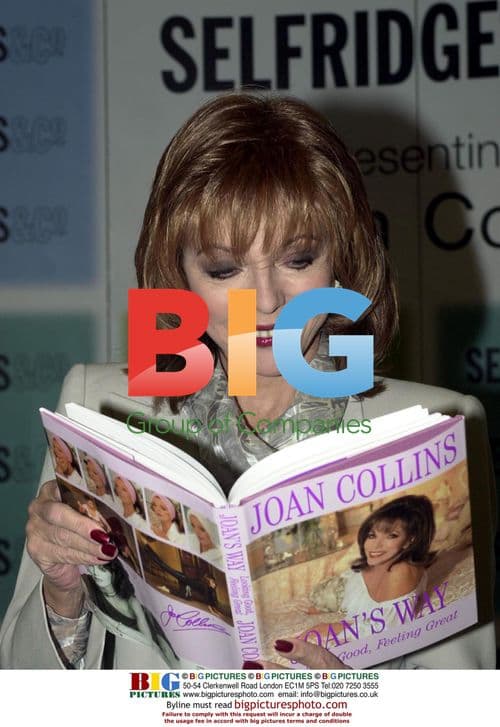 Joan Collins signs book at Selfridges