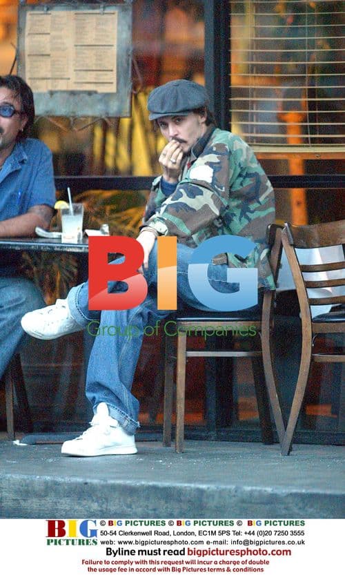Johnny Depp picking his nose in West Hollywood