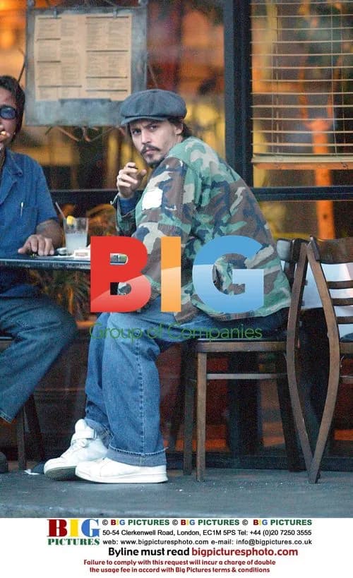 Johnny Depp picks nose outside restaurant