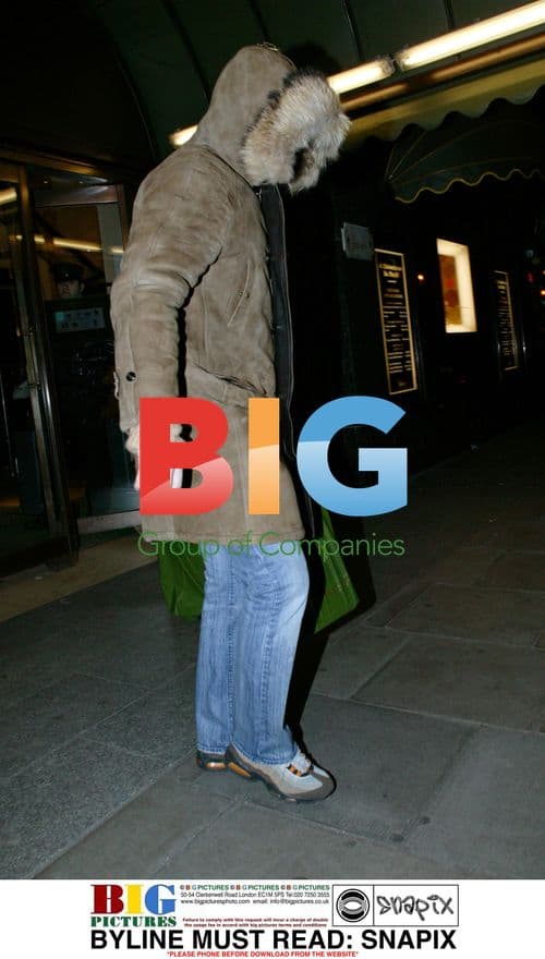 Agnethe Petit Waits for Husband Emmanuelle Outside Harrods
