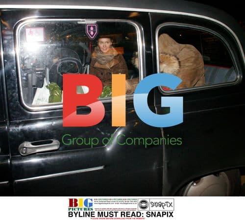 Agnethe Petit waits for footballer husband Emmanuelle