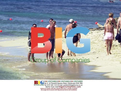 David Beckham and Son Brooklyn on Caribbean Beach