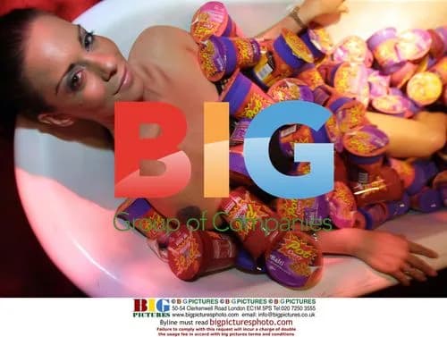 Glamour model Linsey Dawn McKenzie bathing in noodles
