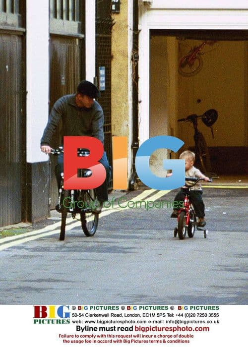 Guy Ritchie and son Rocco on bikes