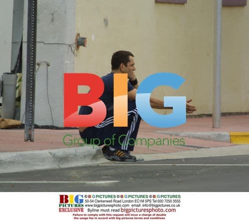 Rupert Everett Walks in Miami Neighborhood