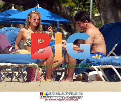 Simon Cowell relaxes on Barbados beach