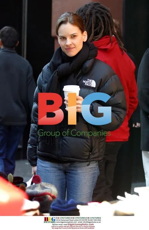 Hilary Swank Keeps Warm on NYC Street