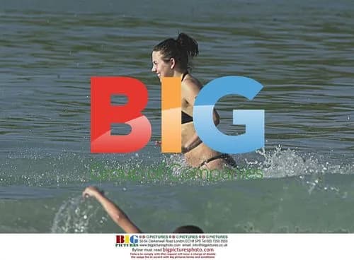 Mel C swims with boyfriend in Barbados