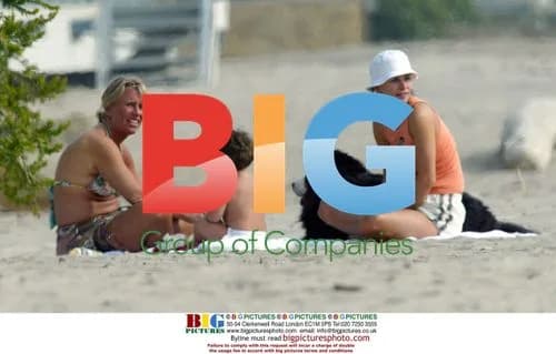 Courteney Cox with Puppy on Malibu Beach