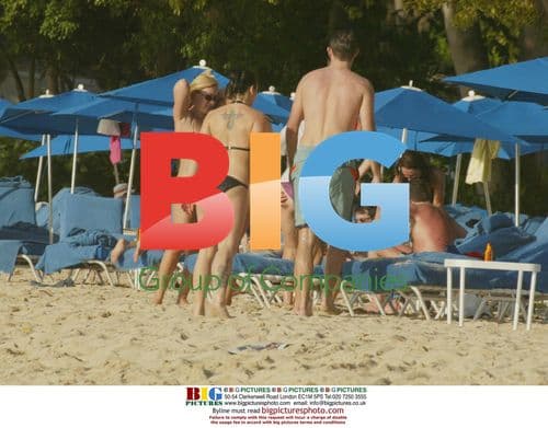 Mel C Enjoys a Swim with Boyfriend