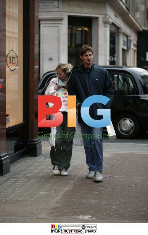 Tony Adams and girlfriend out shopping in London