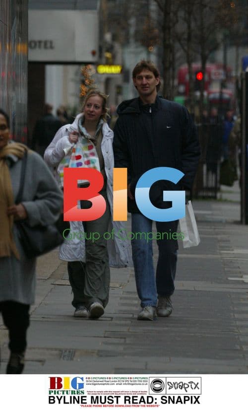 Tony Adams and Girlfriend Shopping in London