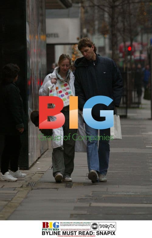 Tony Adams and girlfriend out shopping in London