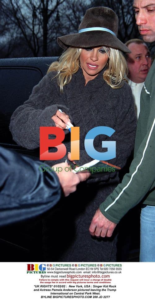 Kid Rock and Pamela Anderson leaving Trump International