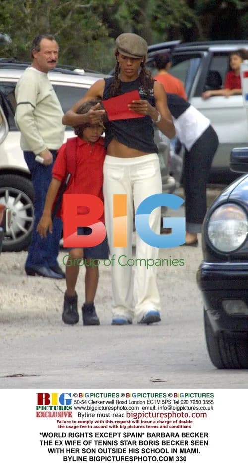 Barbara Becker Seen with Son Outside School