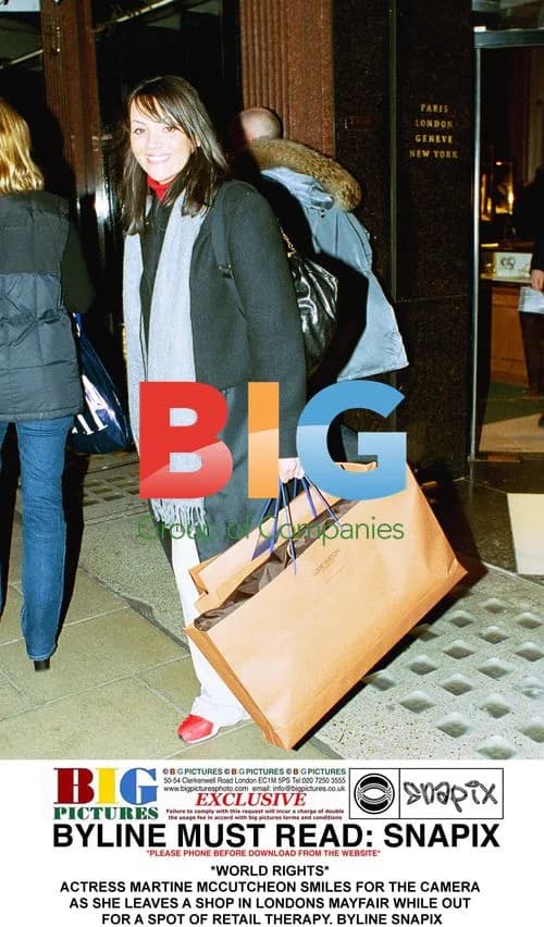 Martine McCutcheon smiles while out shopping in Mayfair