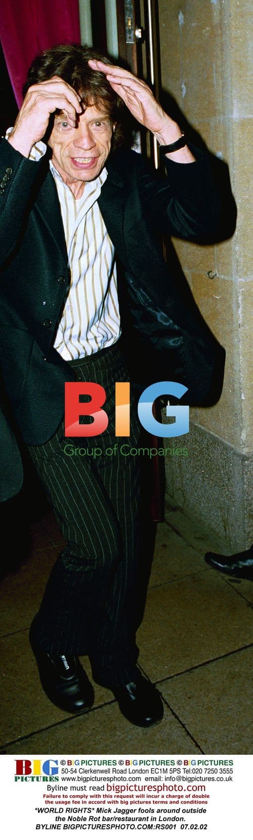 Mick Jagger fools around in London