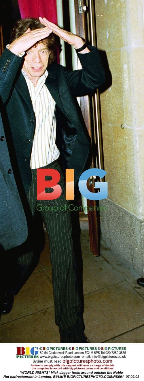 Mick Jagger fools around in London