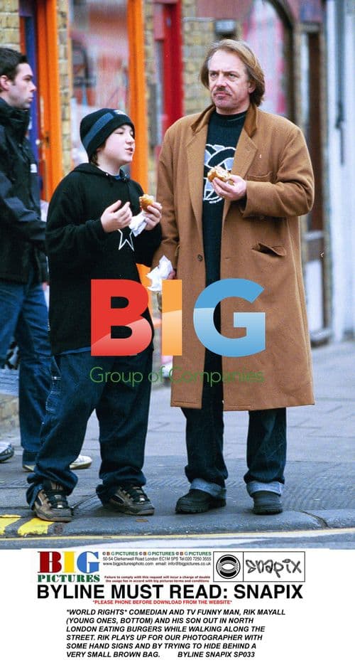 Rik Mayall and Son Eating Burgers
