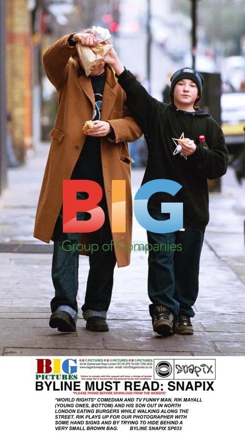Comedian Rik Mayall and son out in London