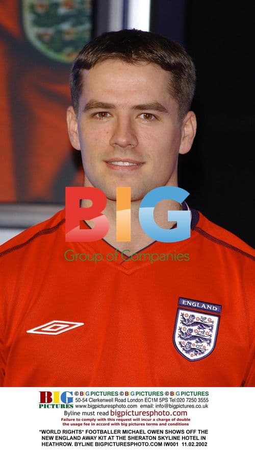 Footballer Michael Owen shows off England away kit