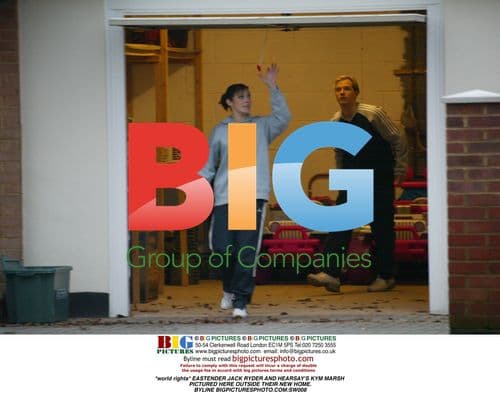 Jack Ryder and Kym Marsh Outside New Home