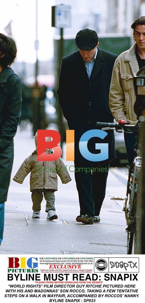 Guy Ritchie and son Rocco on walk in Mayfair