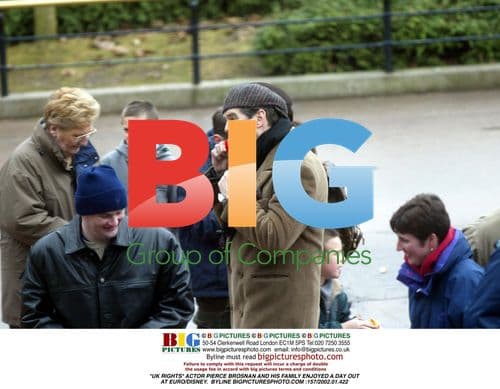 Pierce Brosnan Enjoys Family Day at Disneyland