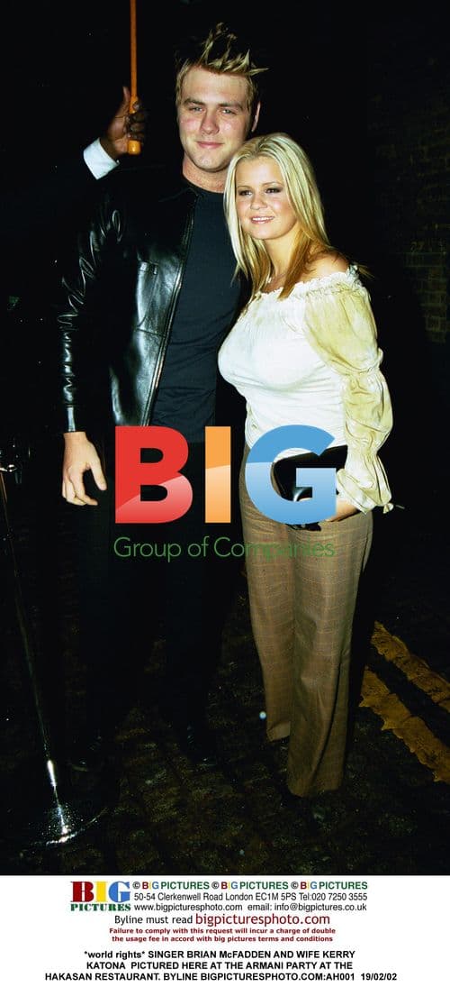 SINGER BRIAN McFADDEN AND WIFE KERRY KATONA AT ARMANI PARTY