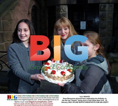 Drew Barrymore celebrates birthday on "Duplex" set