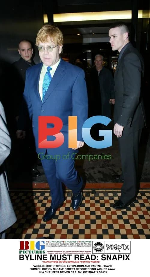 Elton John and David Furnish Leaving Sloane Street