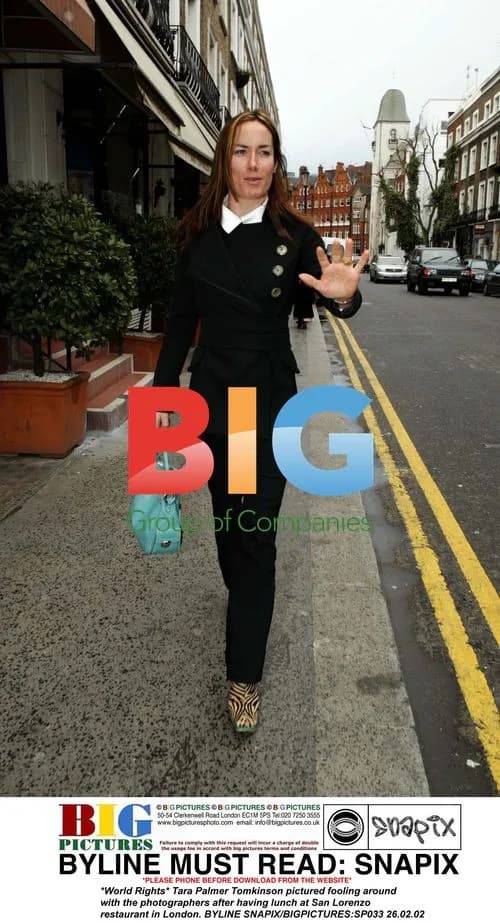 Tara Palmer Tomkinson fooling around with paparazzi