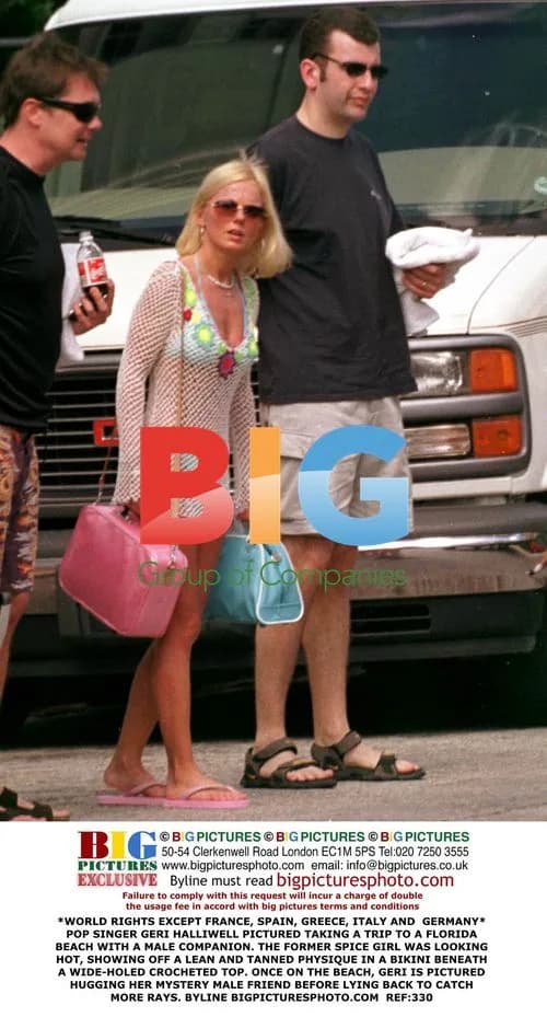 Geri Halliwell on Florida Beach with Male Companion