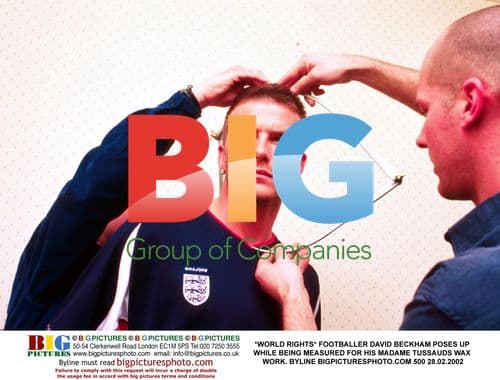 David Beckham Poses for Madame Tussauds Wax Figure