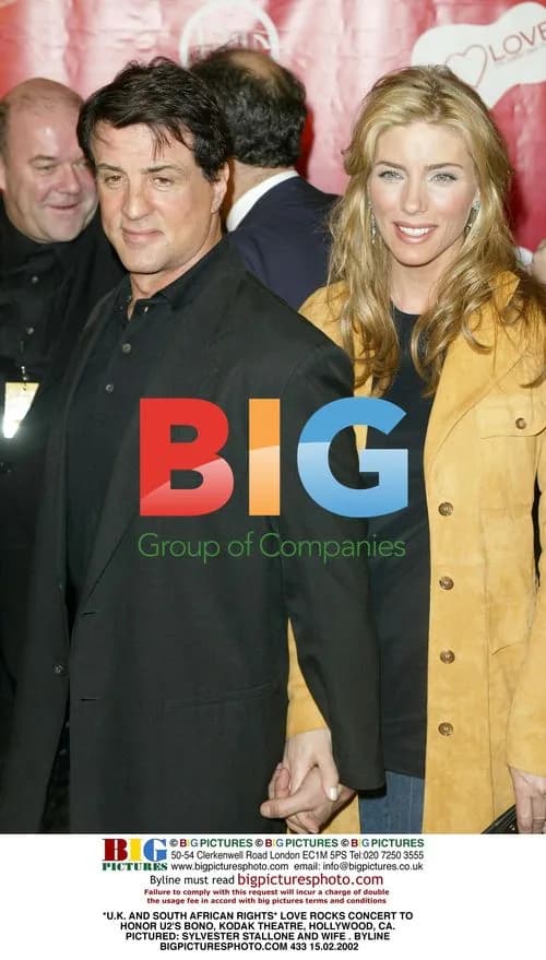 Sylvester Stallone and Wife at LOVE ROCKS Concert