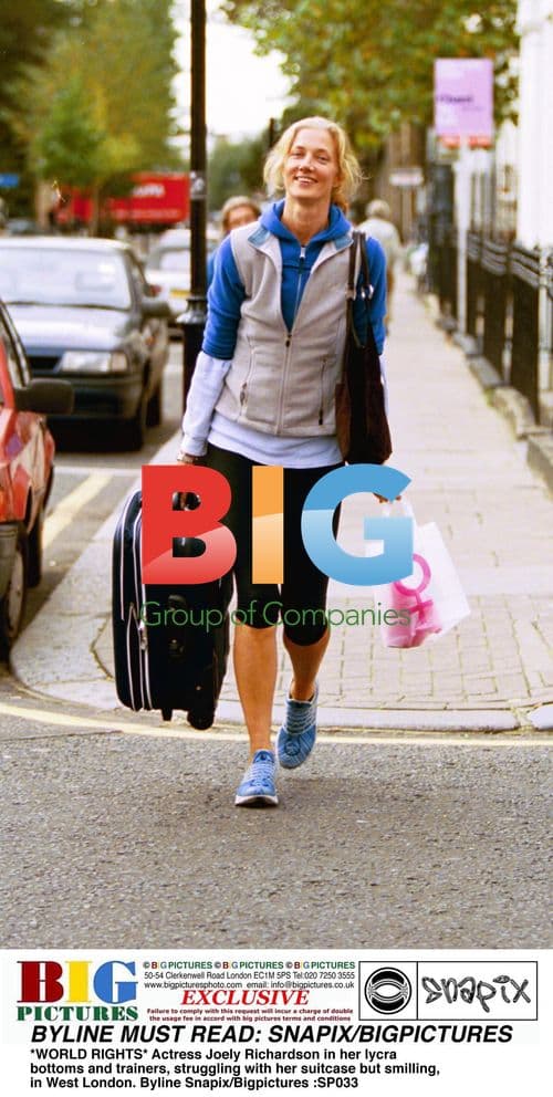 Joely Richardson with Suitcase in West London