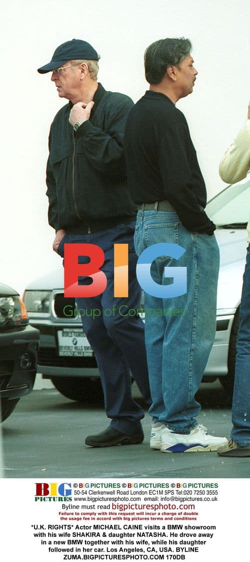 Michael Caine Visits BMW Showroom with Wife & Daughter
