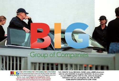 Michael Caine visits BMW showroom with family