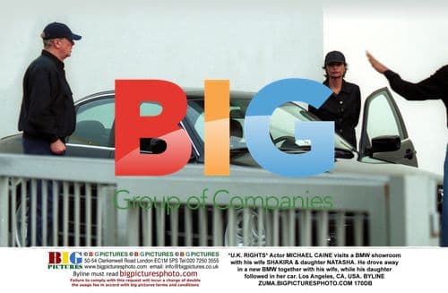 Michael Caine visits BMW showroom with family