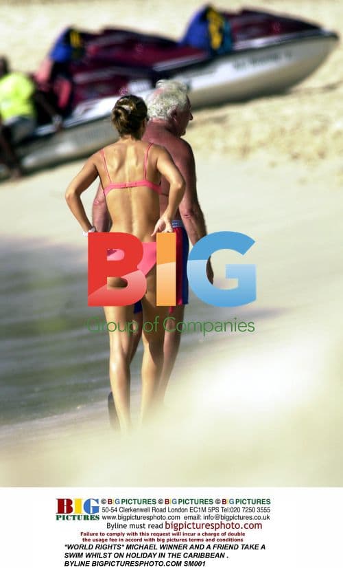 Michael Winner Swims with Friend in Caribbean