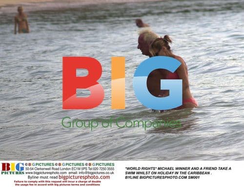 Michael Winner and Friend Swim in Caribbean