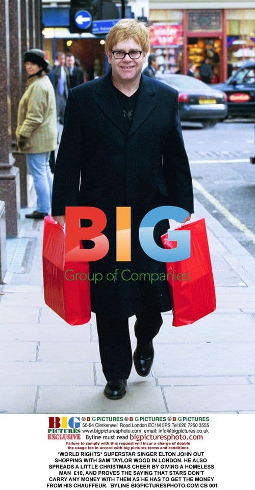 Elton John Shopping with Sam Taylor-Wood in London