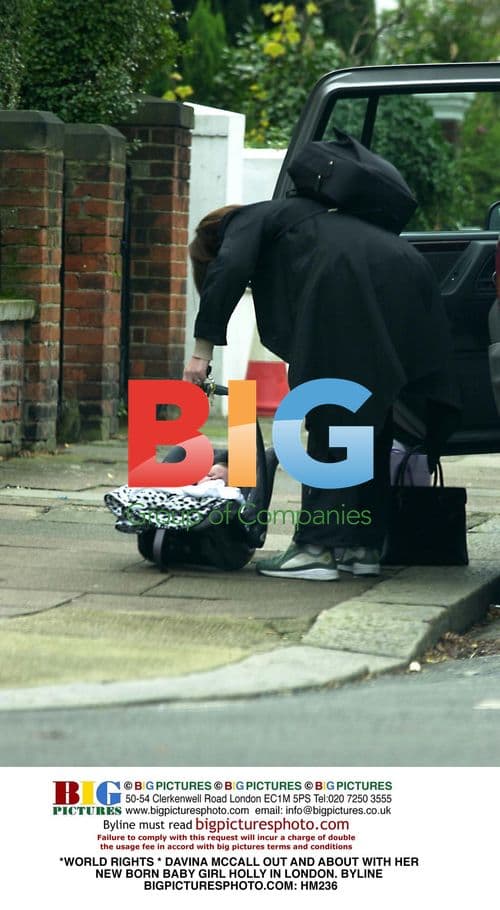 Davina McCall with newborn baby Holly in London