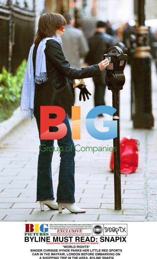 Chrissie Hynde Parks Sports Car in Mayfair