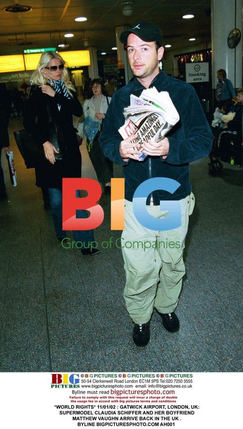 Claudia Schiffer and boyfriend arrive at Gatwick