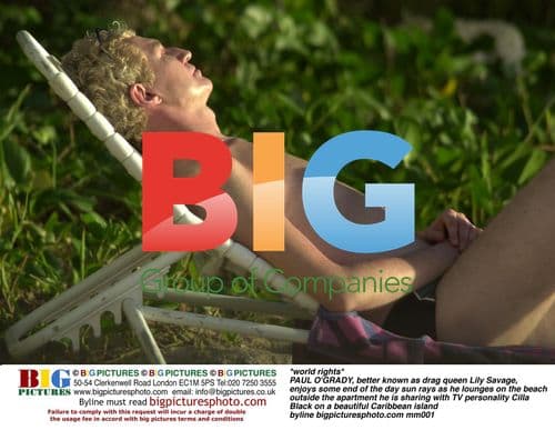 Paul O'Grady Lounges on Caribbean Beach